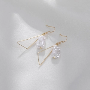 Elegant gold triangle earrings with natural white baroque pearls and minimalist hook design