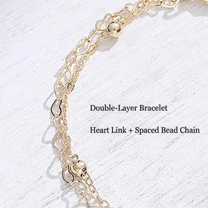 Double-layer 14K gold-plated bracelet with interlocking hearts and metal beads chain