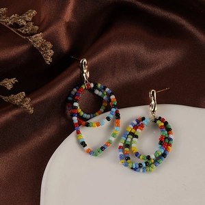 Bohemian handmade beaded hoop earrings with colorful crystals and gold metal studs