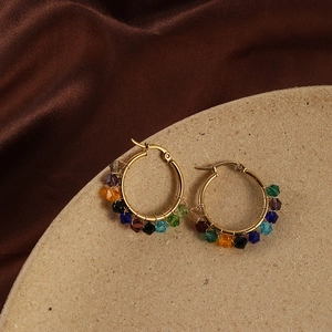 Bohemian gold hoop earrings with handcrafted colorful crystal beads in diverse vibrant tones