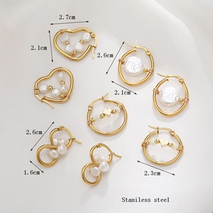 Golden stainless steel heart and pearl earring set with French luxury minimalist design