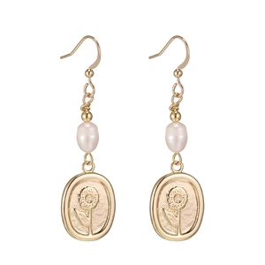 Gold long drop earrings with pearl and sunflower relief pendant for elegant women