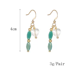 Handmade heart drop earrings with synthetic turquoise and crystal in gold finish