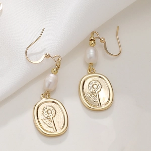 Golden geometric earrings with freshwater pearls and vintage rose flower relief drop