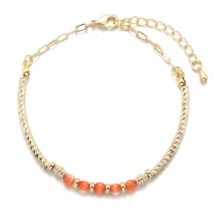 Bracelet perlé minimaliste en or avec pierres œil-de-chat orange et tubes métalliques