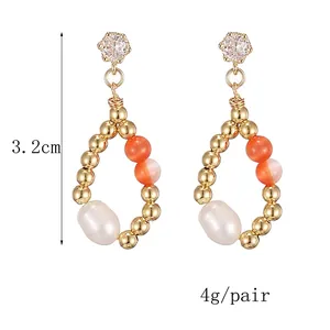 Elegant 14K gold plated earrings with freshwater pearls and orange cat eye stone beads