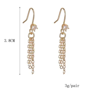 Elegant gold tassel earrings with round cubic zirconia stones, 3.8cm drop length