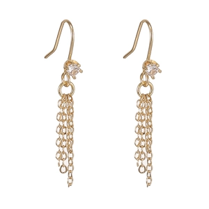 Elegant gold tassel earrings with sparkling zircon drop in a minimalist fashion style