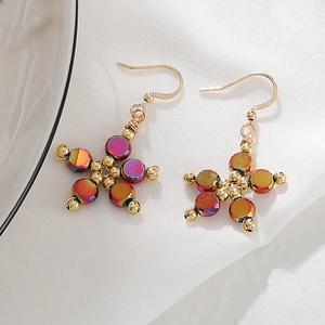 Colorful floral star-shaped earrings with metallic gradient beads and gold hooks