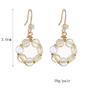 Elegant gold drop earrings with clear faceted crystal beads and zircon, 3.6cm long