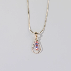 Minimalist stainless steel waterdrop necklace with colorful beads on a gold snake chain