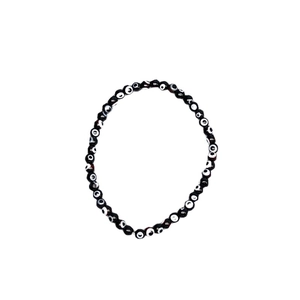 Elastic beaded bracelet featuring round black evil eye glass beads on white background