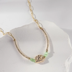 14K gold plated necklace with green cat-eye stones and irregular lava textured pendant