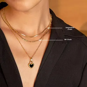 Three-layer gold necklace featuring a black heart pendant, NK flat chain, and snake chain