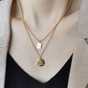 Double-layer 18K gold plated titanium steel necklace with Good Luck and Paris pendants
