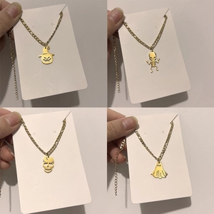 Gold titanium steel Halloween necklace set with ghost, skull and pumpkin pendants
