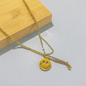 Golden double chain necklace with round yellow smiley face pendant in polished 18K gold finish