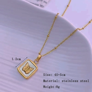 Collana vintage francese con farfalla e madreperla bianca in acciaio inossidabile
