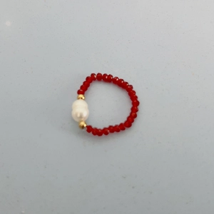 Handmade red crystal bead ring featuring a white oval pearl and gold accents