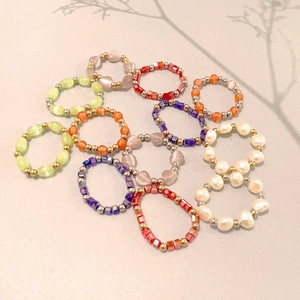 Colorful beaded ring set with vintage crystal stones and pearls in elastic style