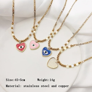 Collier pendentif cœur œil protecteur plaqué or 18K avec émail coloré et zircones