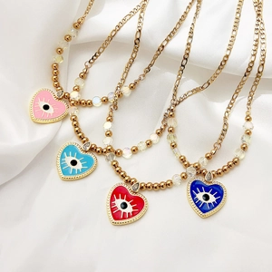 Collier cœur œil maléfique plaqué or 18K avec émail coloré et chaîne perlée mixte