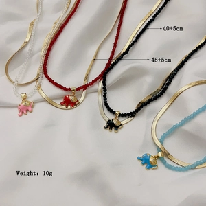 Double-layered gold snake chain necklace with colorful elephant pendant for women