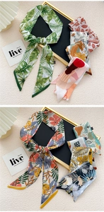 Détails de divers foulards twilly longs et étroits aux motifs floraux et géométriques