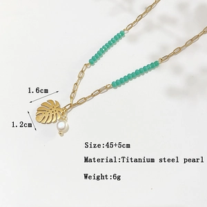 18K gold titanium steel necklace with green beads, monstera leaf and pearl pendant