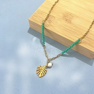 18K gold monstera leaf and pearl pendant necklace with green beaded accents for women