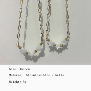 Gold stainless steel necklace with three white shell heart and star charms 45cm chain