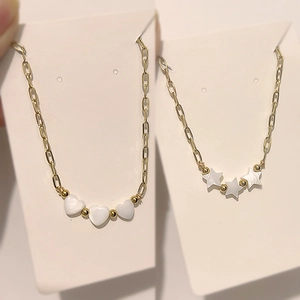 Gold paperclip chain necklaces with heart and star mother of pearl shell pendants
