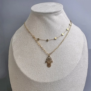 Double-layered 18K gold-plated stainless steel Hamsa Hand necklace with heart charms