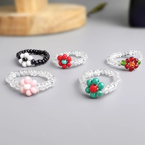 Five-piece set of handmade beaded flower rings in colorful dopamine style aesthetic