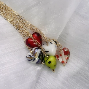 Golden stainless steel necklace with five colorful hand-painted glass heart charms