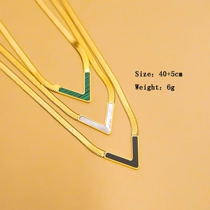 Three V-shaped shell pendant necklaces in green, white, and black on gold snake chains