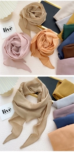 Detailed texture of lightweight solid color diamond scarf with soft natural wrinkles