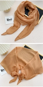 Detail view of lightweight caramel silk scarf showing texture and styling possibilities