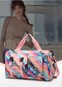 Detail view of starry pattern travel bag with pink handles and functional front pocket