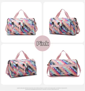 Pink travel duffel bag with star gradient pattern and luggage strap back view