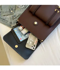 Detail view of large capacity interior for dark brown retro PU leather backpack