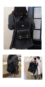 Detail of vintage black PU leather backpack showing white contrast stitching and gold buckle