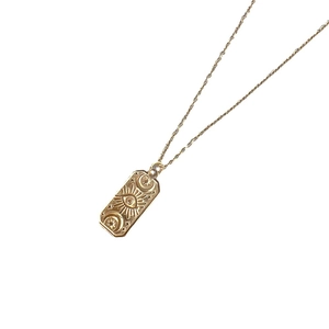 18K gold-plated celestial rectangular pendant necklace with sun and moon engravings