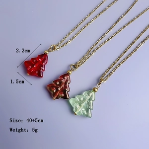 Colorful glass Christmas tree pendant necklaces in red and green with gold steel chains