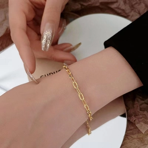 Adjustable 18K gold plated stainless steel chain bracelet with textured oval links