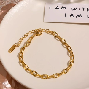 Adjustable 18K gold-plated stainless steel chain bracelet with textured oval links