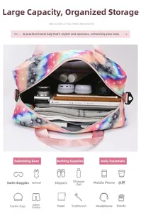 Detailed internal view showing large capacity and compartments of the galaxy print travel bag