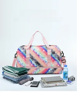 Large capacity travel bag with colorful gradient pattern shown with daily travel items