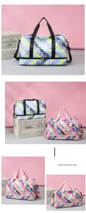 Detail of travel gym bag featuring waterproof fabric, shoe compartment, and starry print