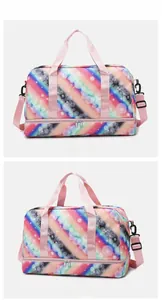 Rainbow striped travel bag with pink straps showing separate bottom shoe compartment